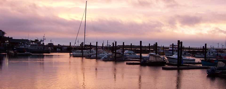 Catch a beautiful sunset across the street at the harbor.